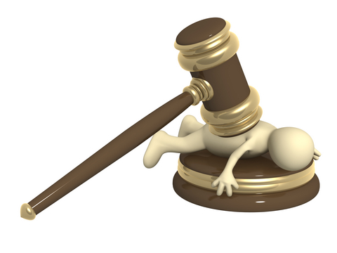 small-3d-person-underneath-gavel.jpg