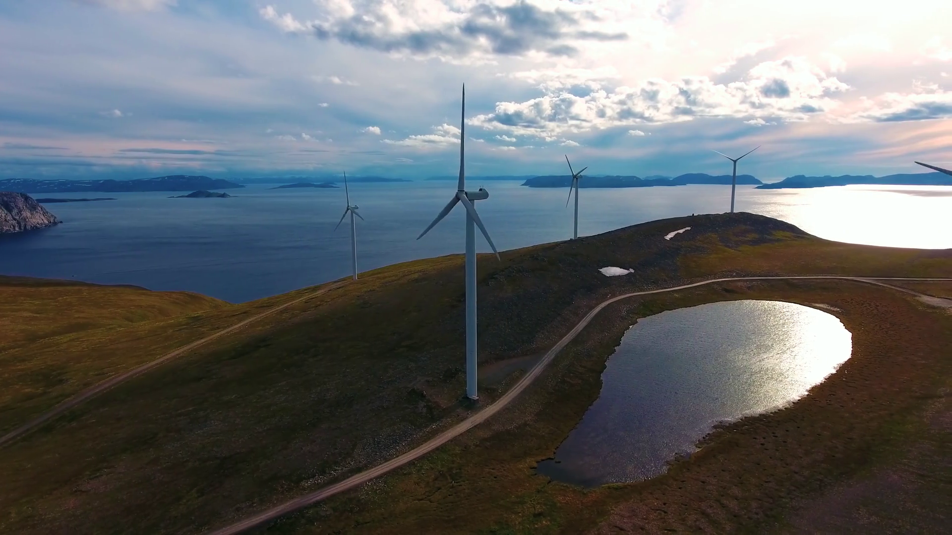 windmills-for-electric-power-production-arctic-view-havoygavelen-windmill-park-havoysund-northern-norway-aerial-footage_remorofx4x_thumbnail-1080_01.png
